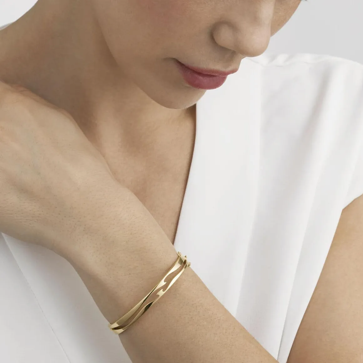 georg_jensen_armring_fusi_1.webp GEORG JENSEN ARMRING FUSION GULTGULL