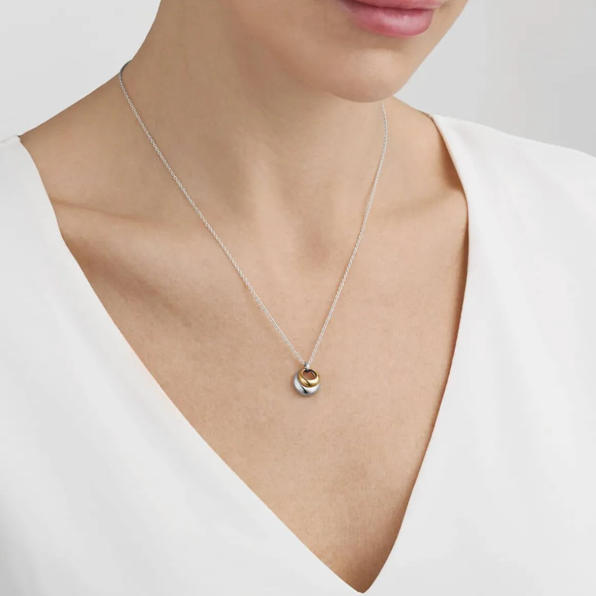 georg_jensen_halsmykke_cu_1.webp GEORG JENSEN HALSMYKKE CURVE SØLV & GULL