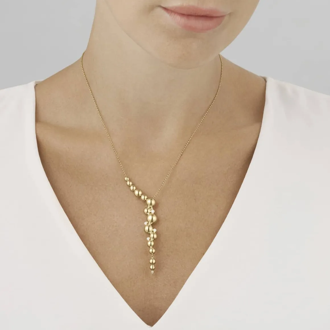 georg_jensen_smykke_moonl_1.webp GEORG JENSEN SMYKKE MOONLIGHT GRAPES GULTGULL MED DIAMANTER